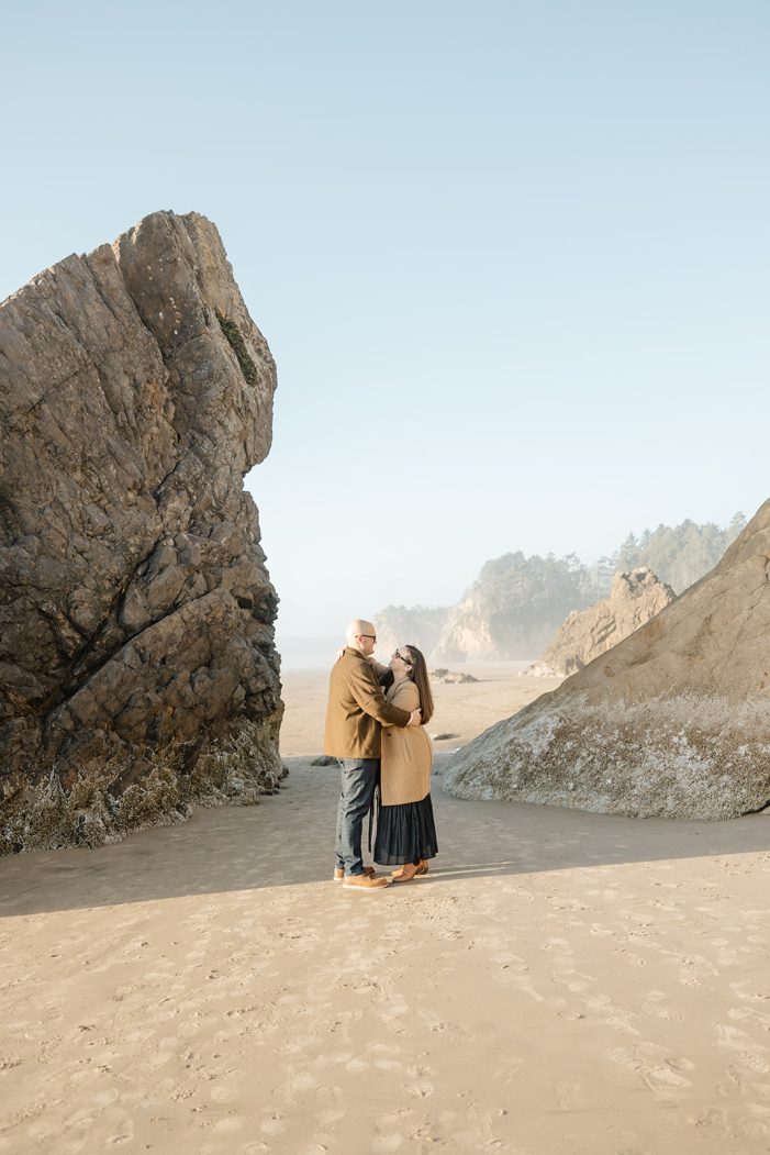 couple walks at hug point