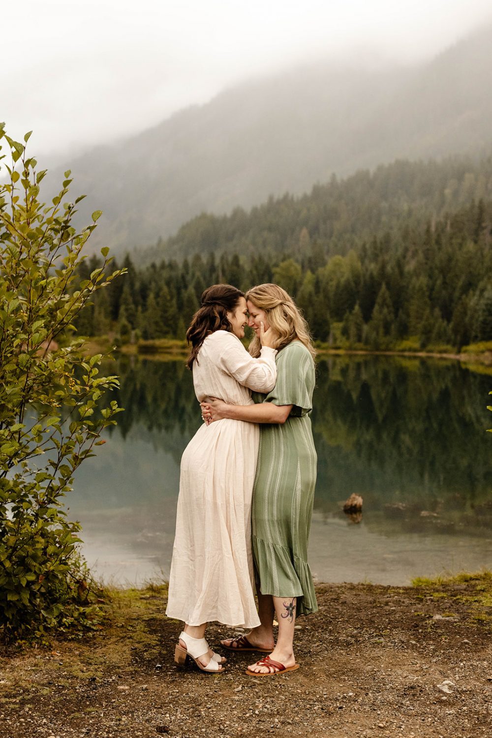 couple leans in for a kiss at their fall engagement photos session