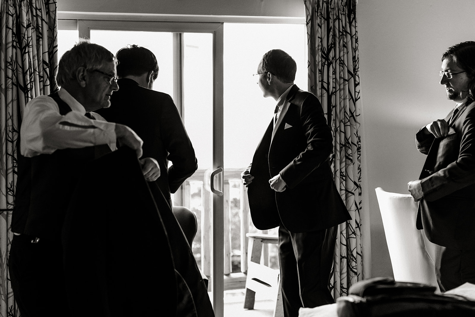 black and white. groom gets ready for seattle aquarium wedding.