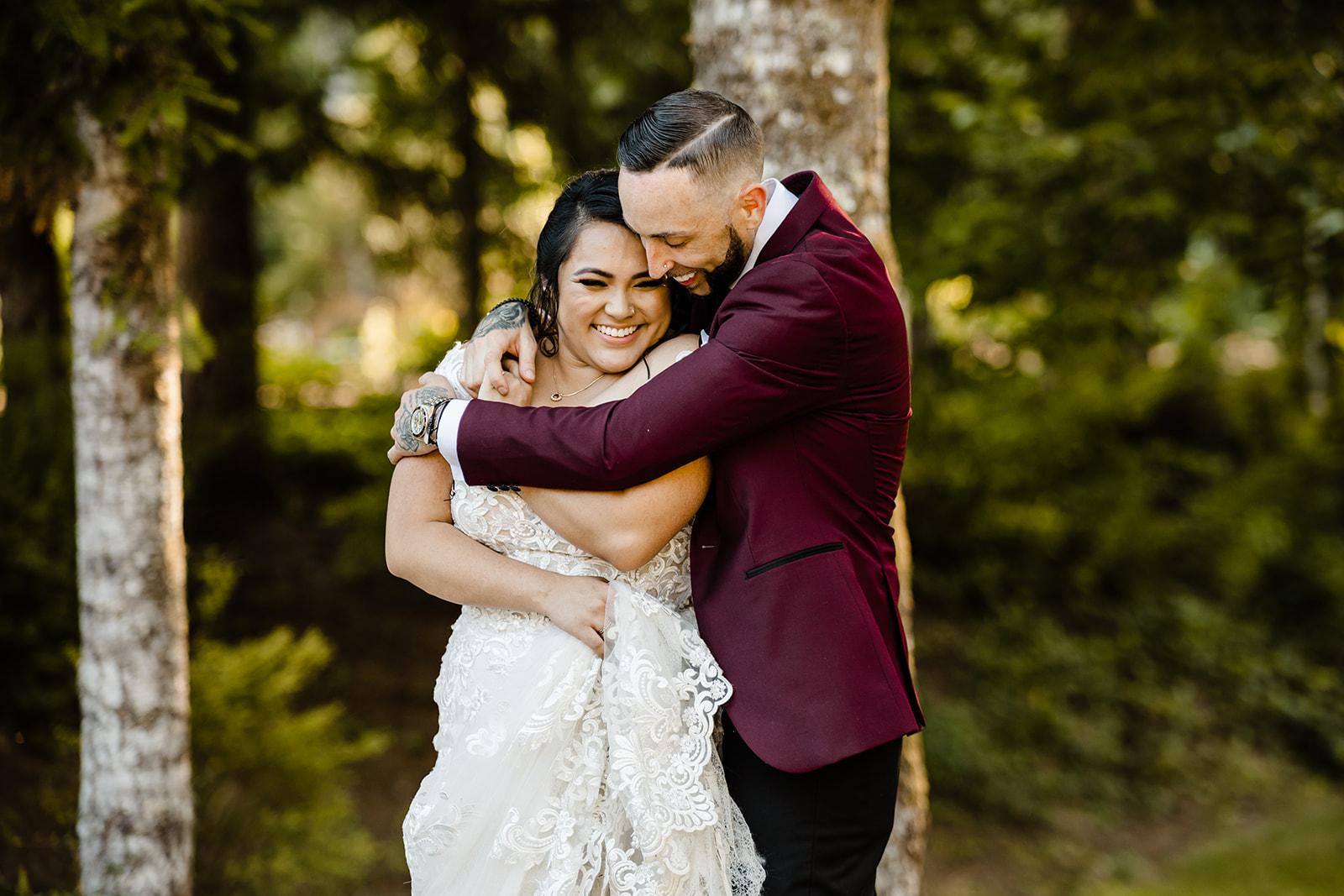 wedding advice from newlyweds blog. groom wraps bride up in a big hug from behind.