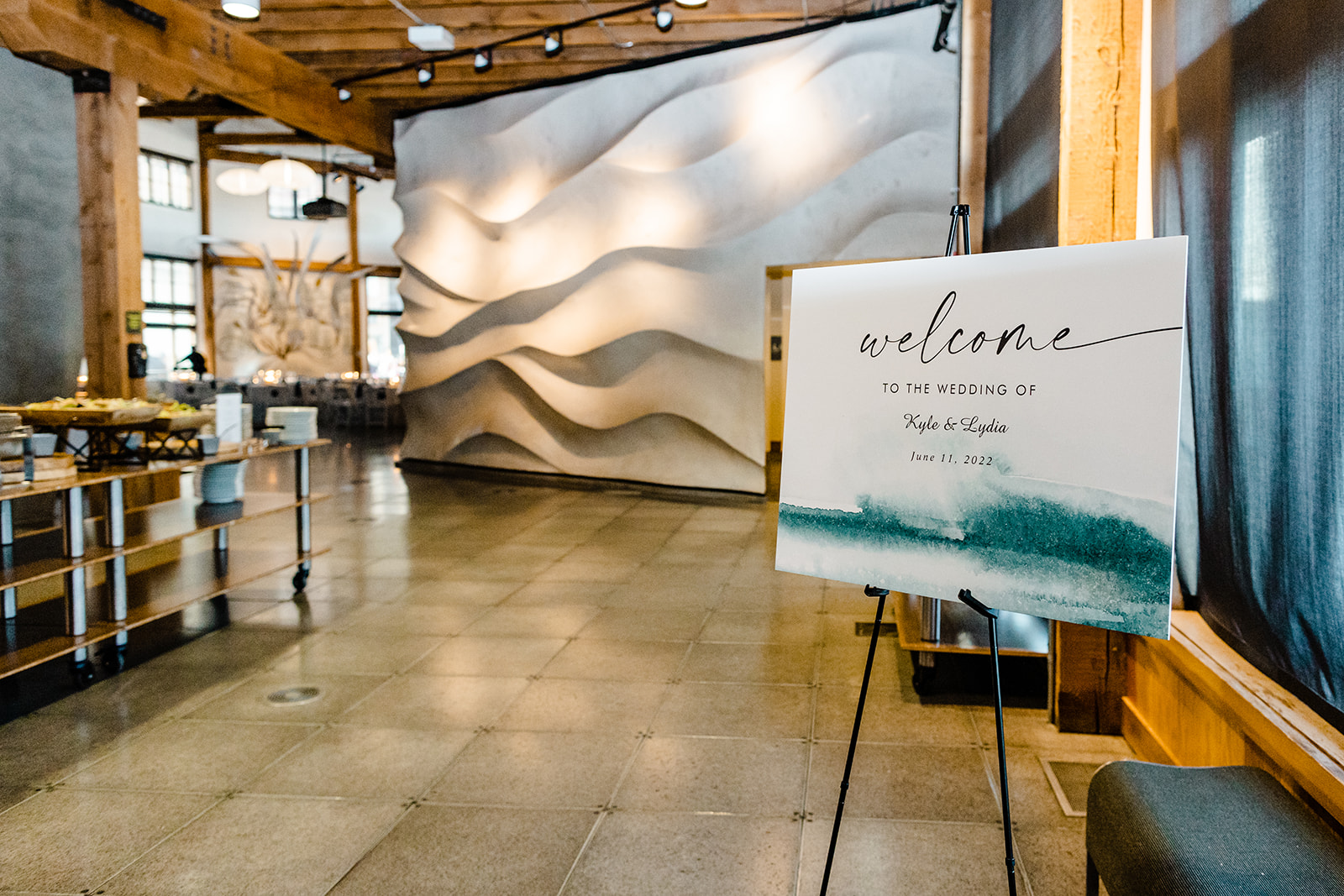 welcome sign at seattle aquarium wedding reception