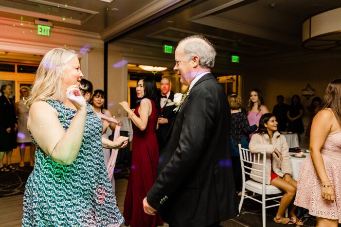 guests dance at woodmark hotel wedding