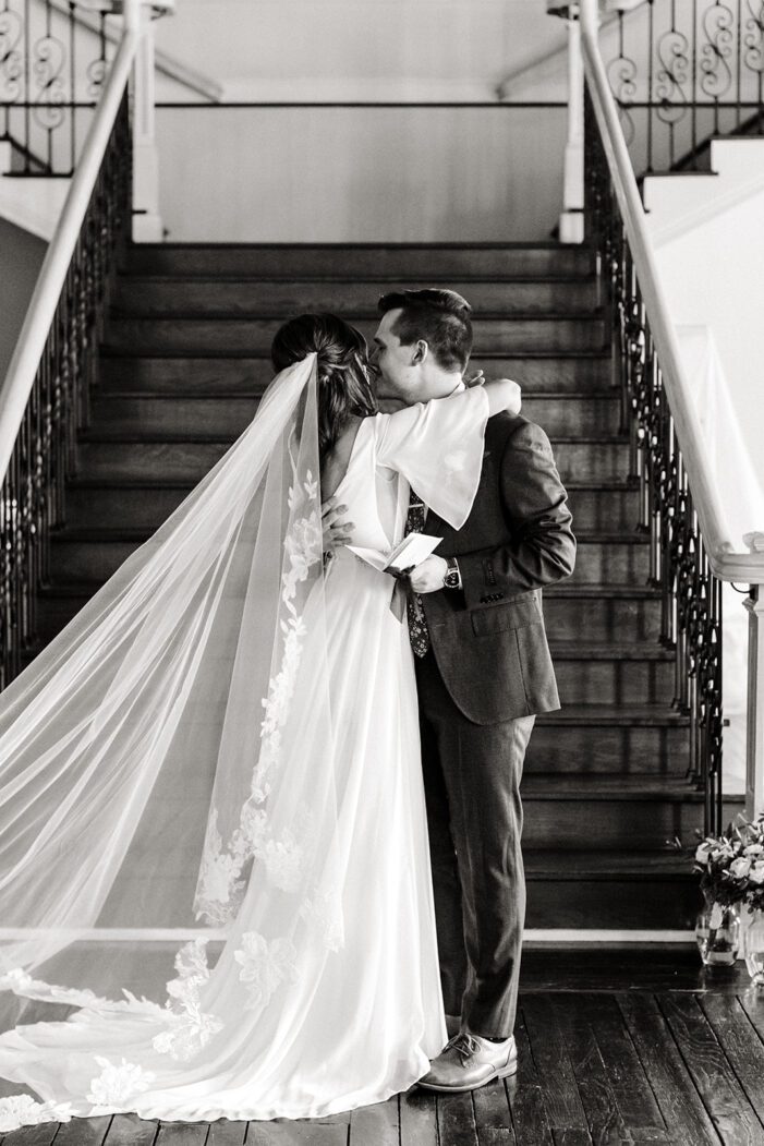 bride and groom read vows during classic wedding photography