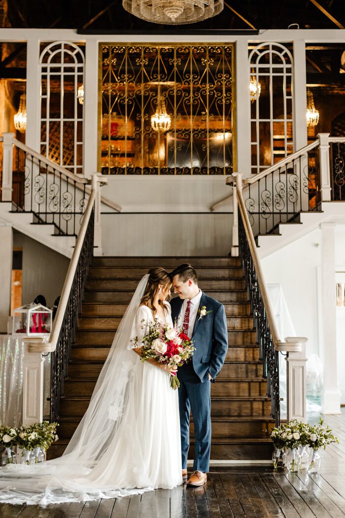 bride and groom face each other during classic wedding photography