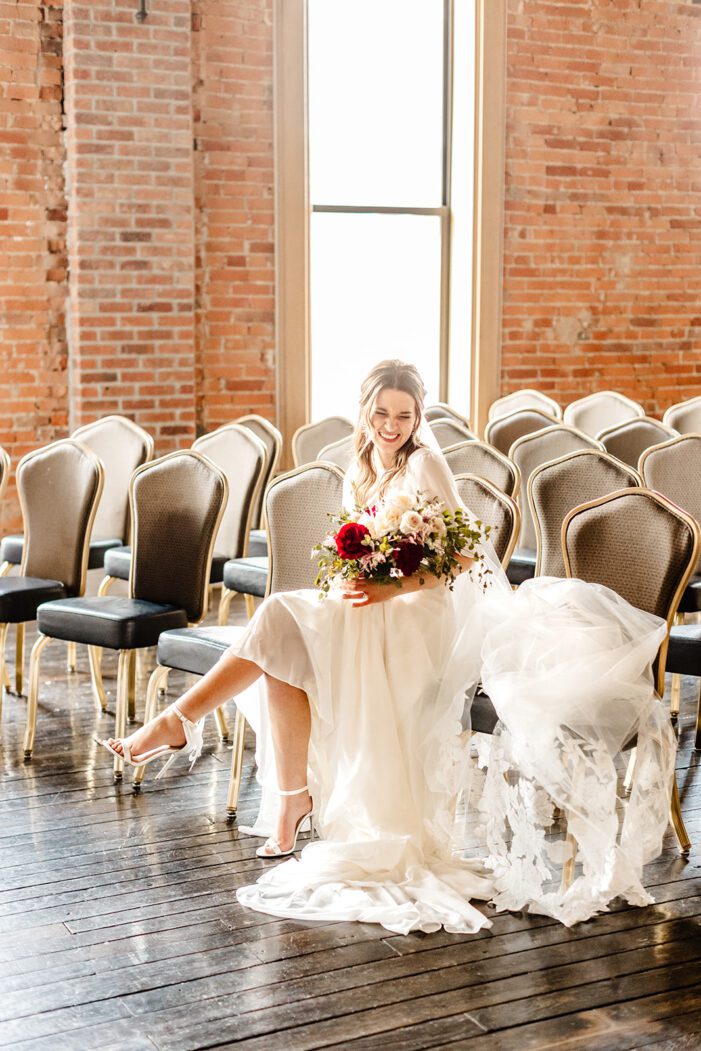 bride sits on chairs