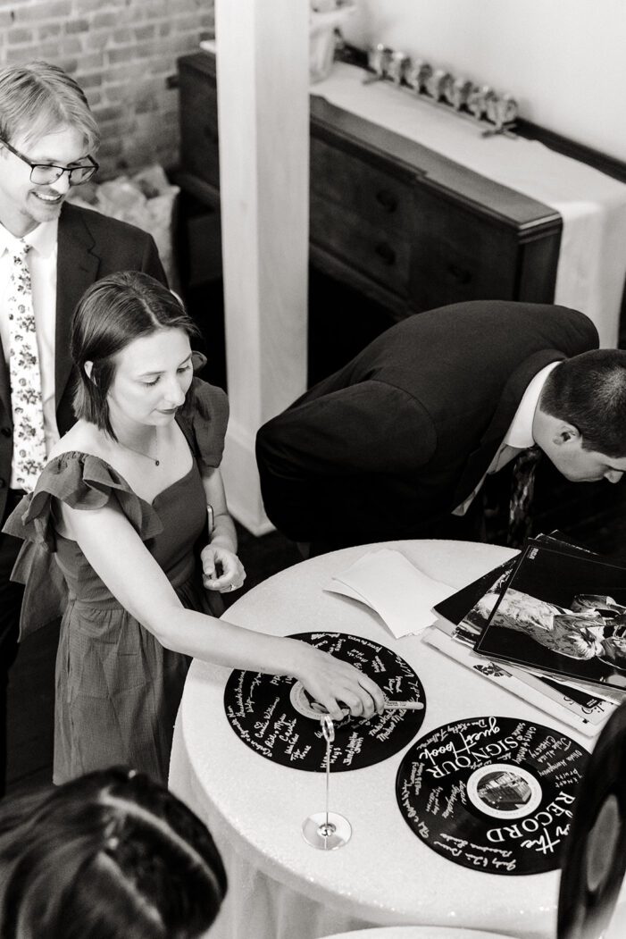 wedding guests sign records