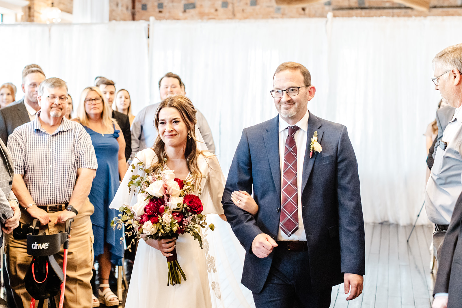 bride walks down aisle