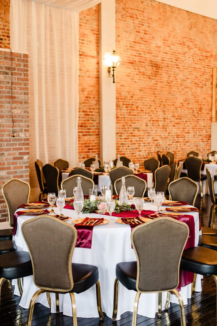 wide shot of red and gold tablescape