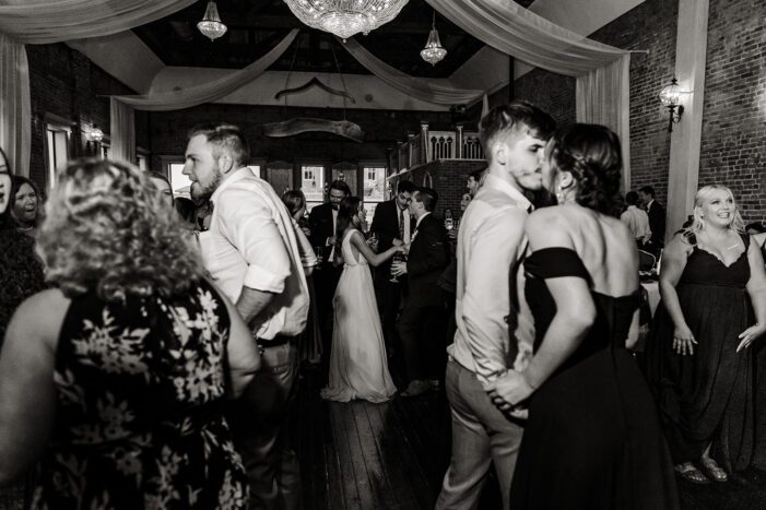wedding guests dance at reception