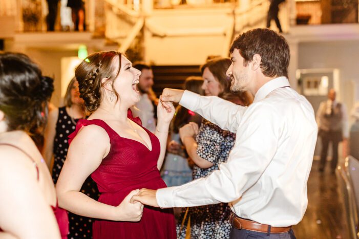 wedding guests dance at reception