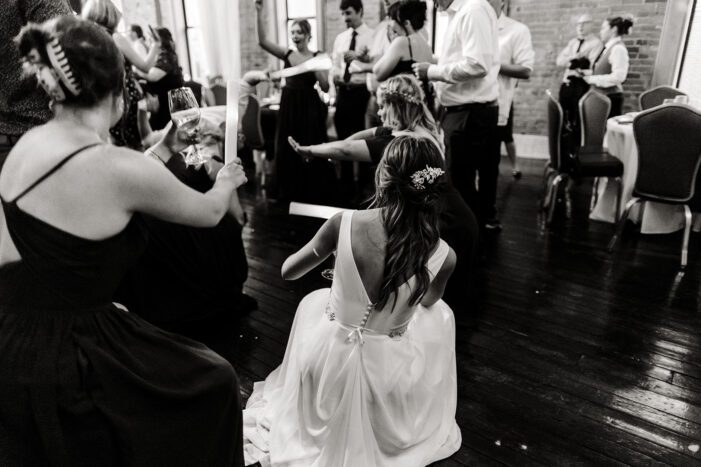 wedding guests dance at reception