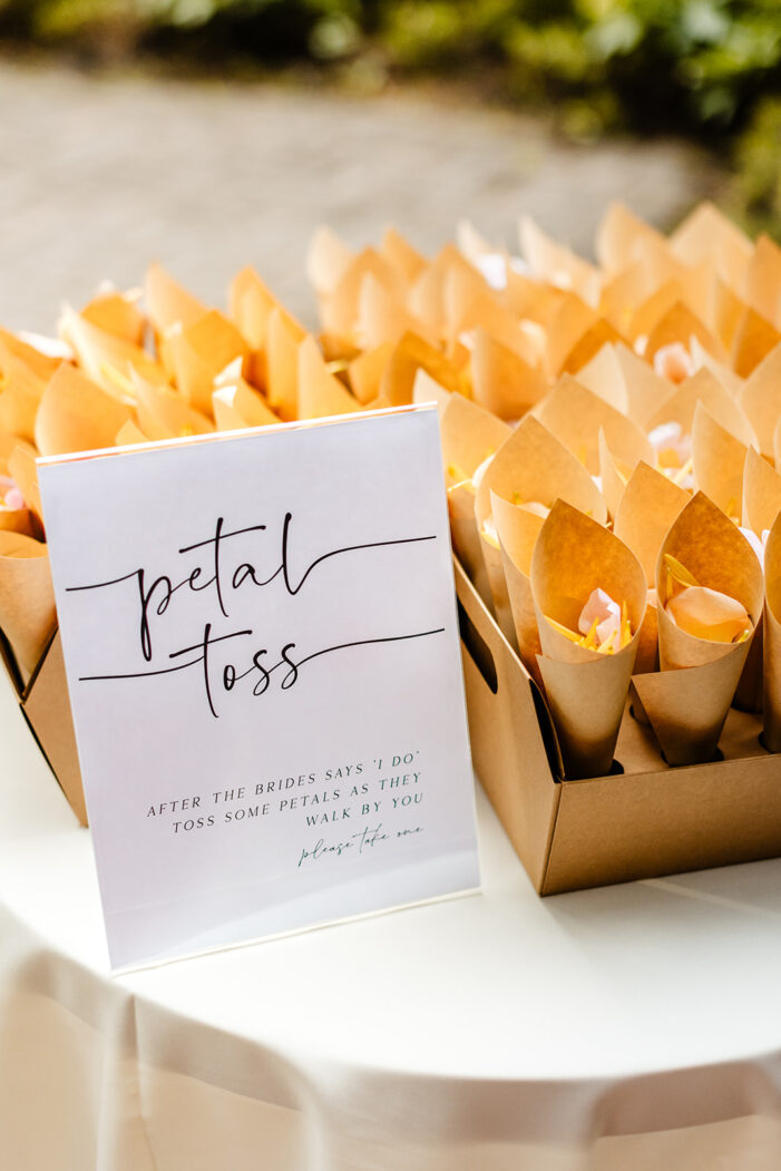 sign indicates petal toss