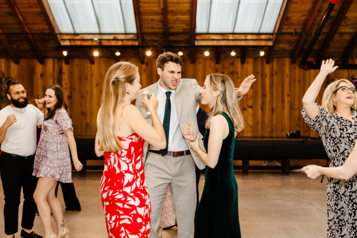 wedding guests dance at wedding reception