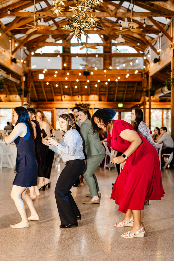 wedding guests dance at wedding reception