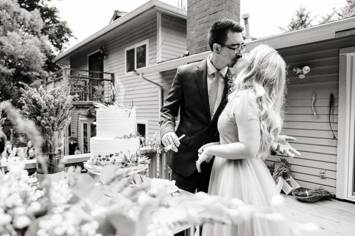 bride and groom kiss