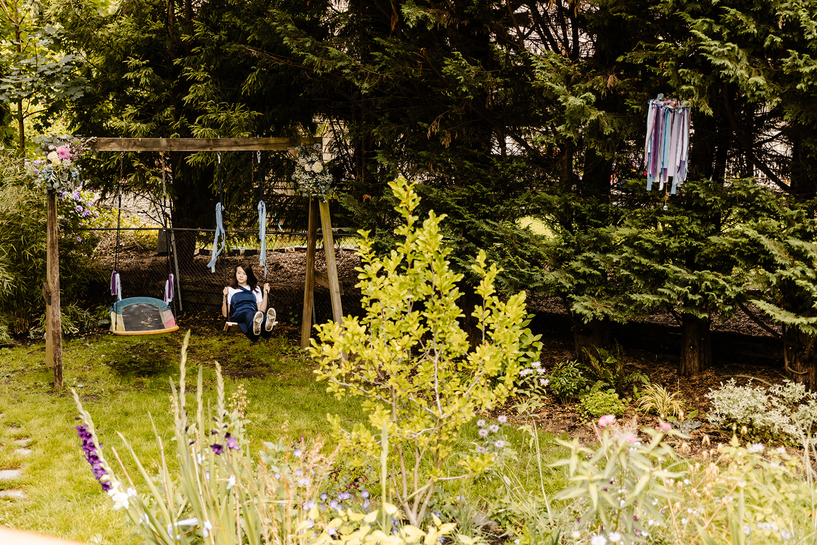 child swings in the backyard