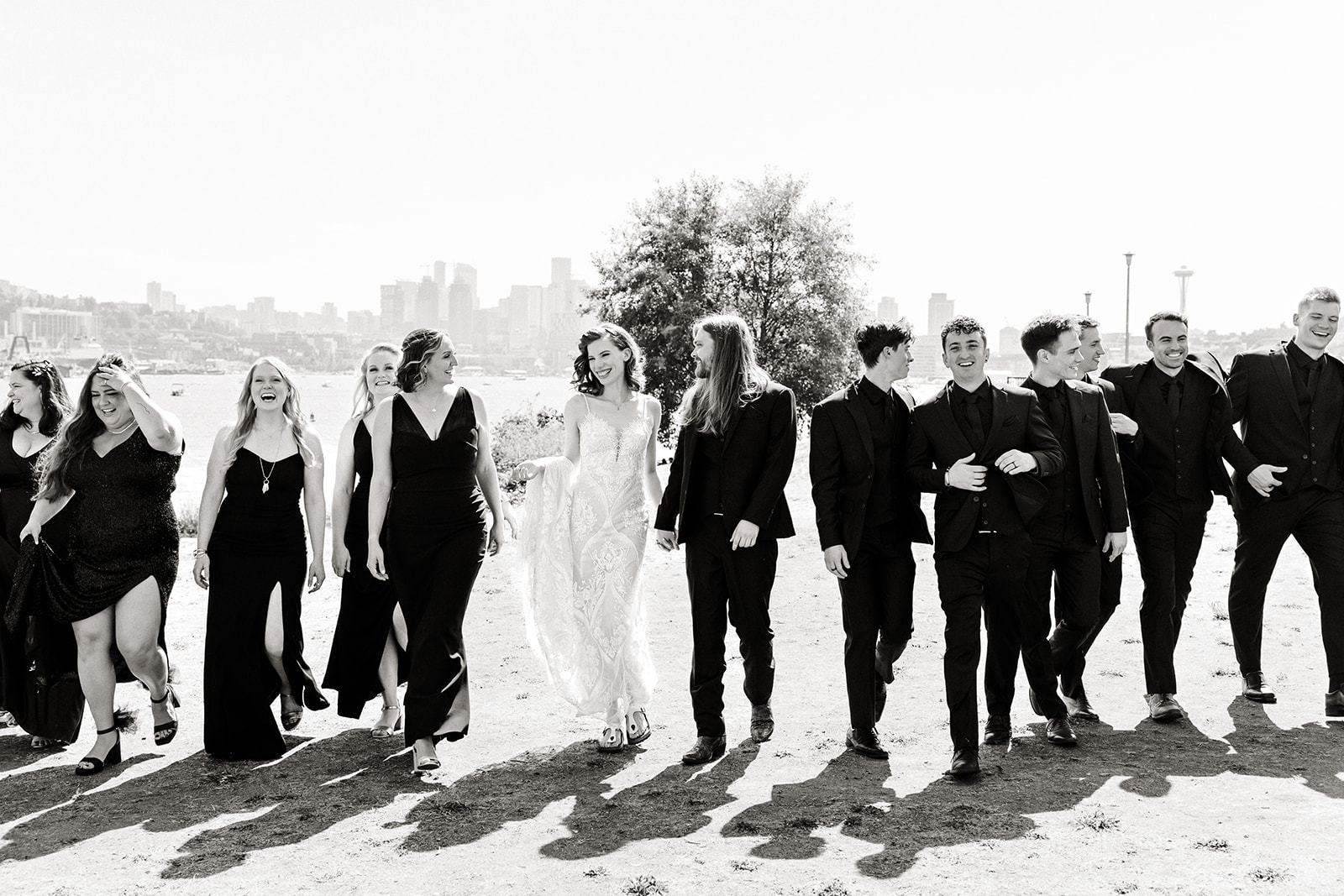 bridal party walks towards camera