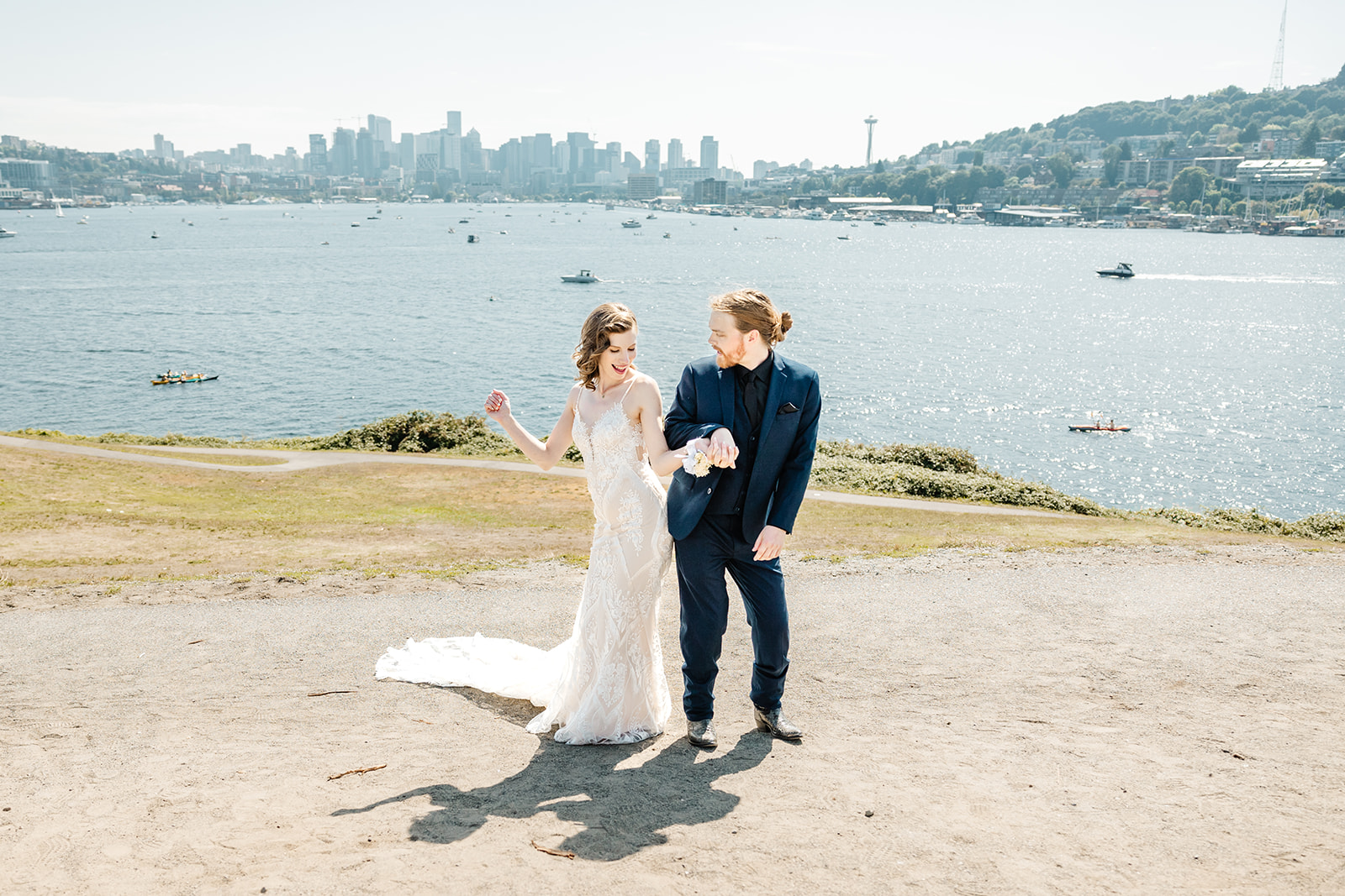 bride and groom bump hips