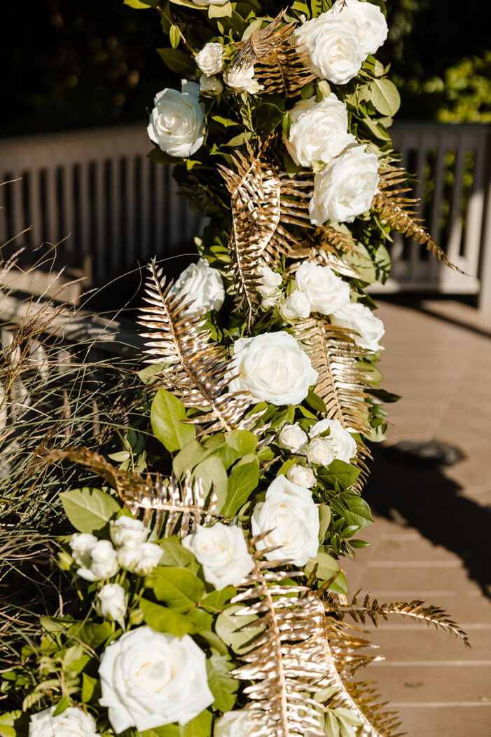 white and green florals and gold accents
