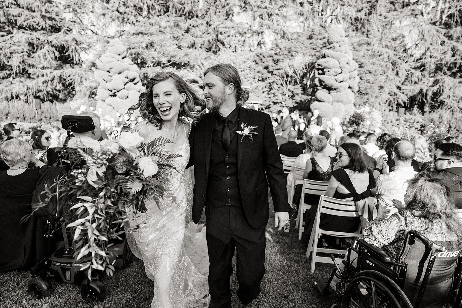 bride and room walk up aisle after ceremony