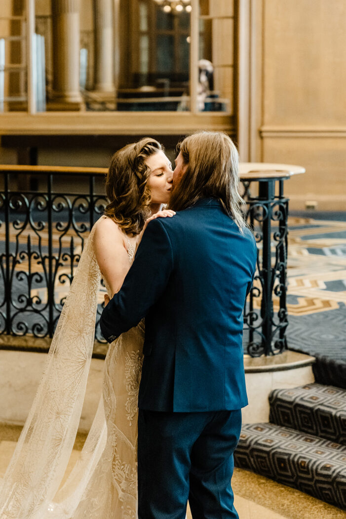 bride and groom kiss at fairmont hotel