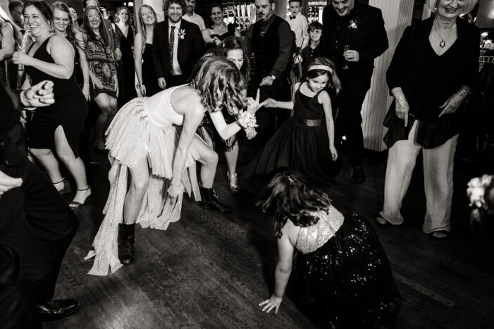 bride dances among wedding guests