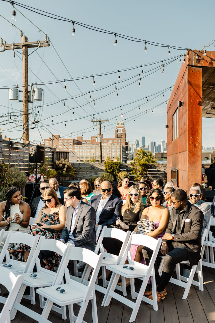 ceremony guests wait at within sodo for ceremony to begin