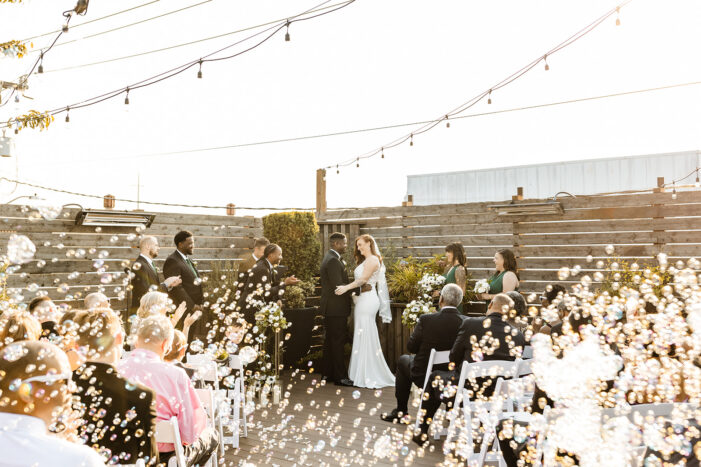 guests blow bubbles at the end of ceremony at Within Sodo wedding venue