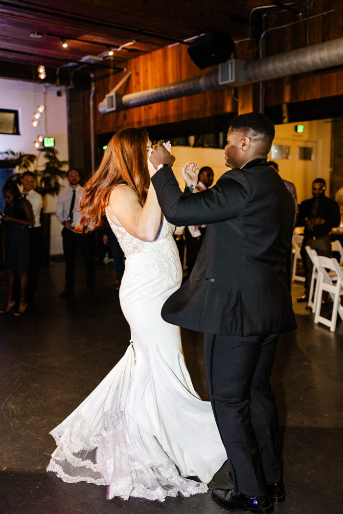 bride and groom dance at Within Sodo wedding reception