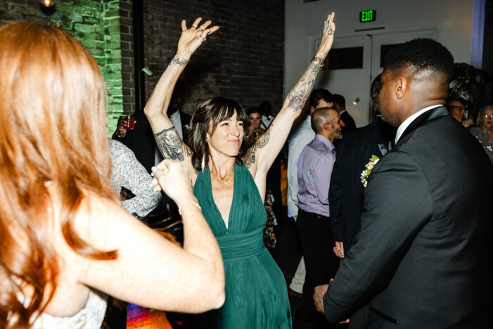 wedding guests dance at Within Sodo wedding reception