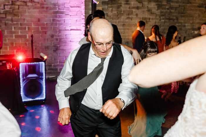 wedding guests dance at Within Sodo wedding reception
