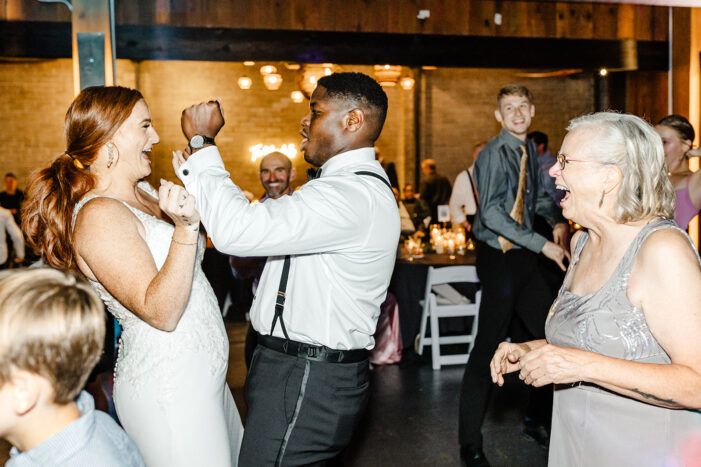 wedding guests dance at Within Sodo wedding reception