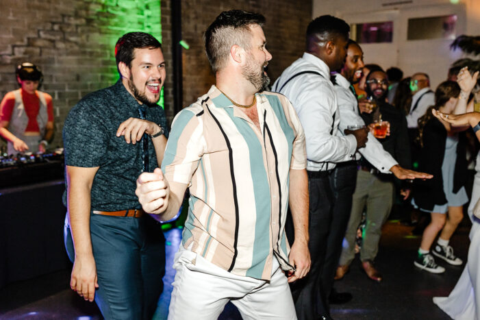wedding guests dance at Within Sodo wedding reception