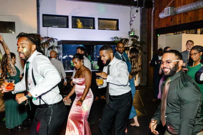 wedding guests dance at Within Sodo wedding reception