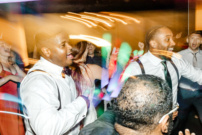 wedding guests dance at Within Sodo wedding reception