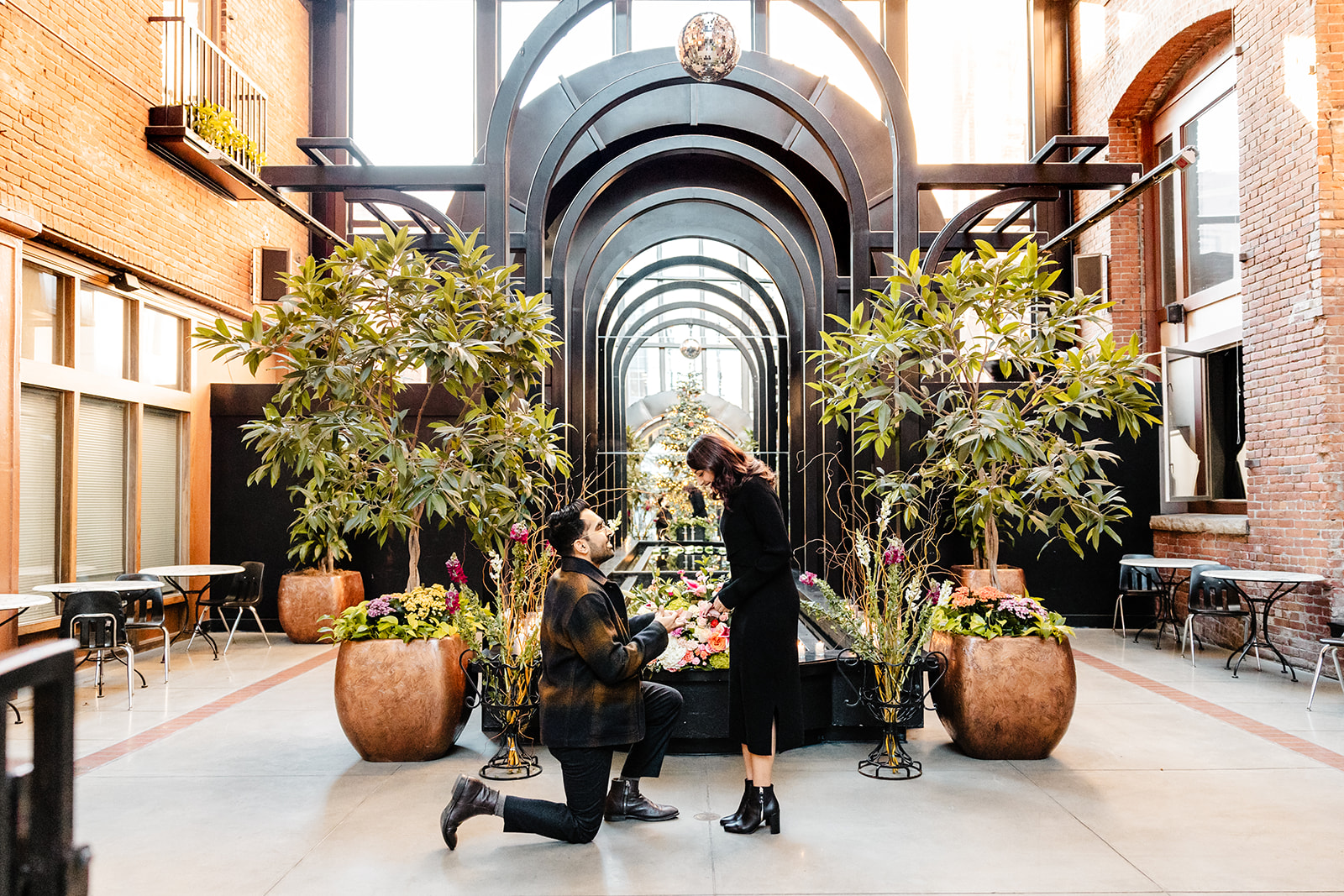 couple looks at each other during proposal
