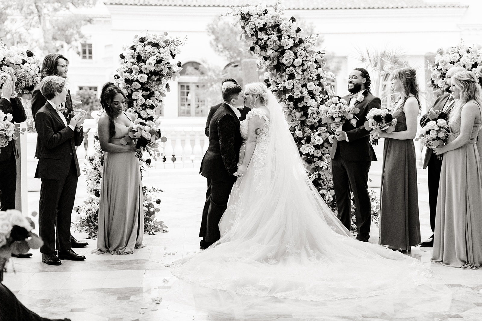 two brides kiss during ceremony in vegas