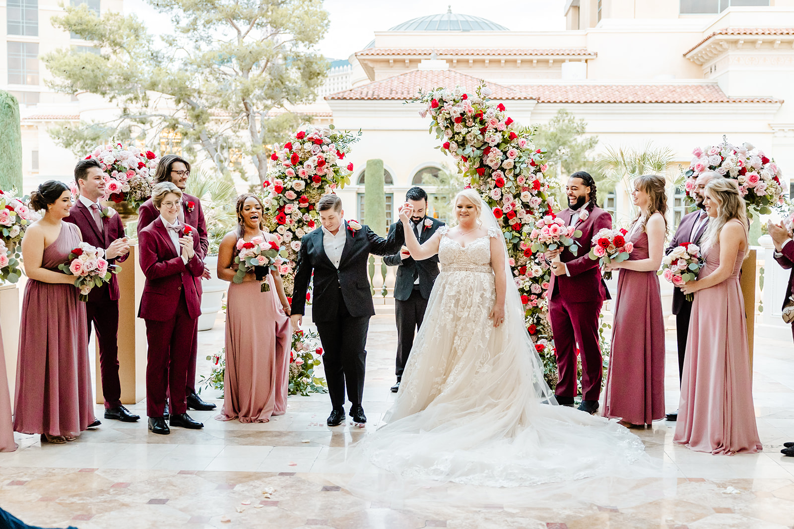 two brides cheer after ceremony in las vegas
