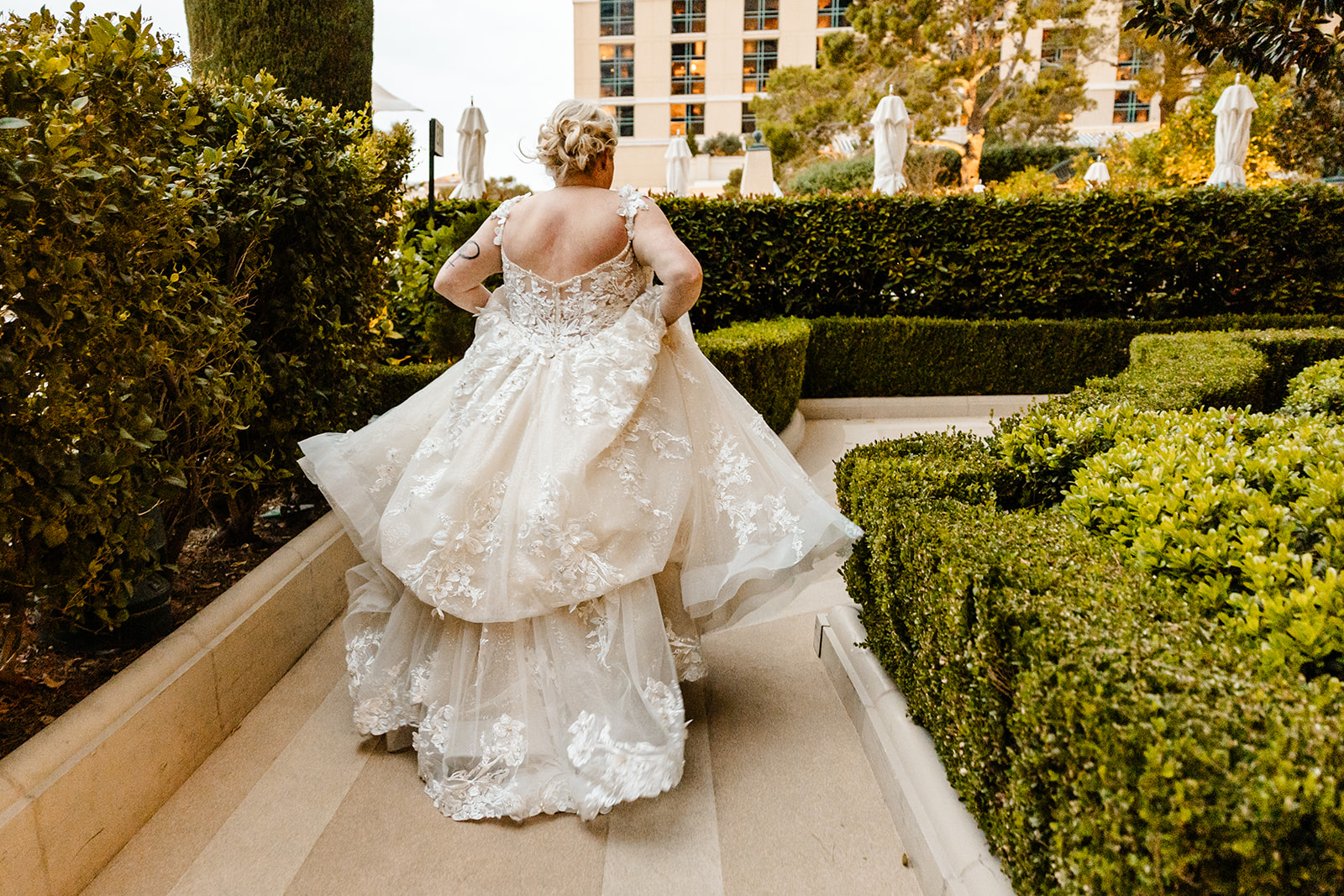 bride running through garden