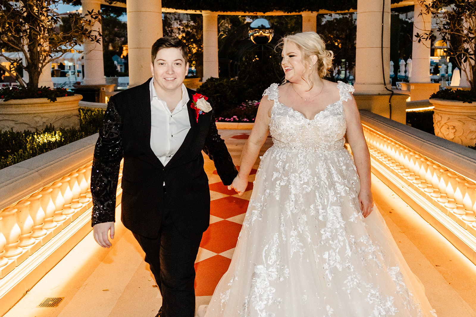 two brides walk through vegas hotel