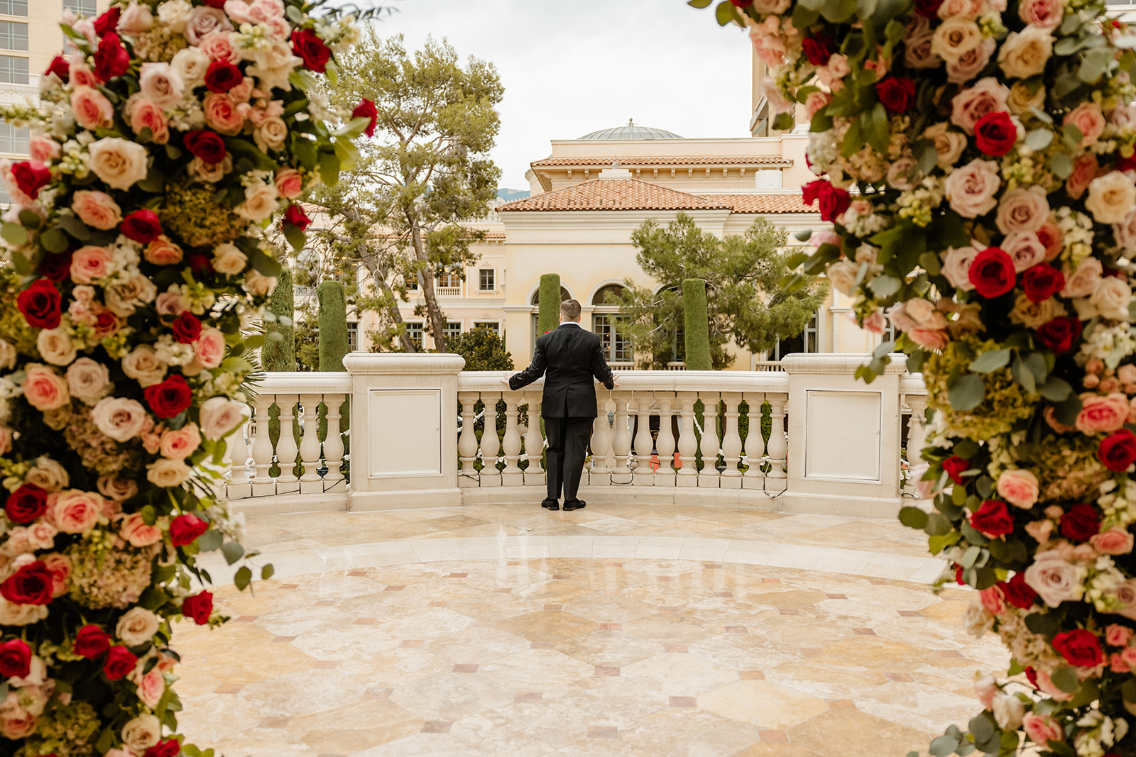 bride stands at terrace
