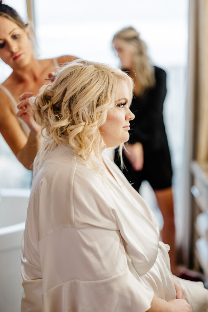 bride gets her hair done