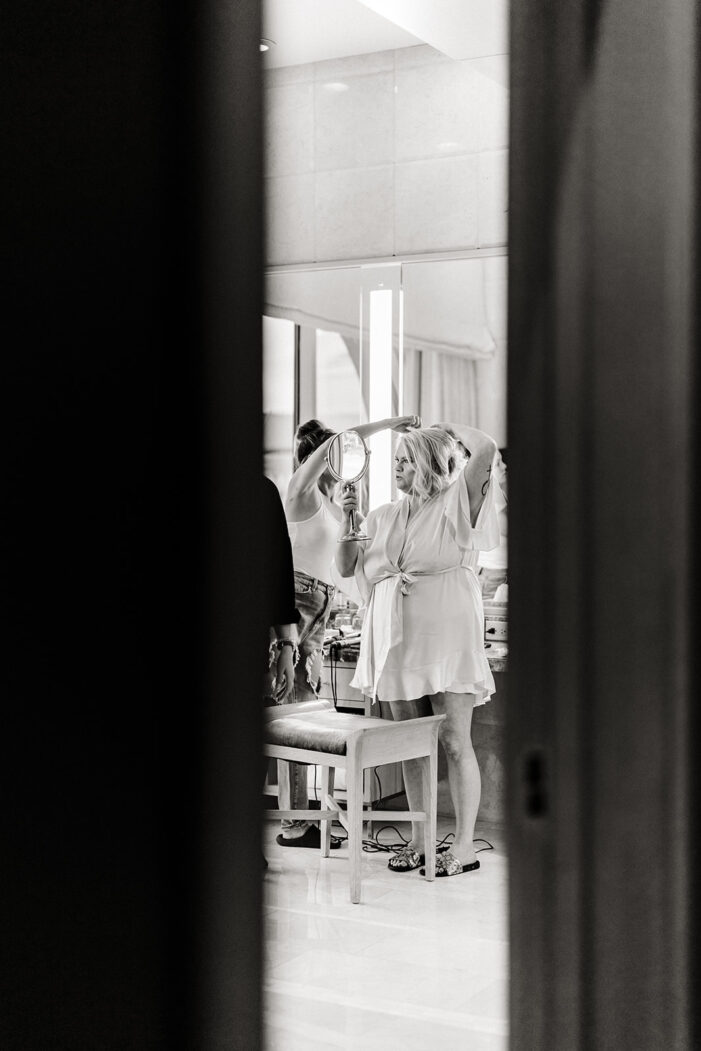 bride gets hair done