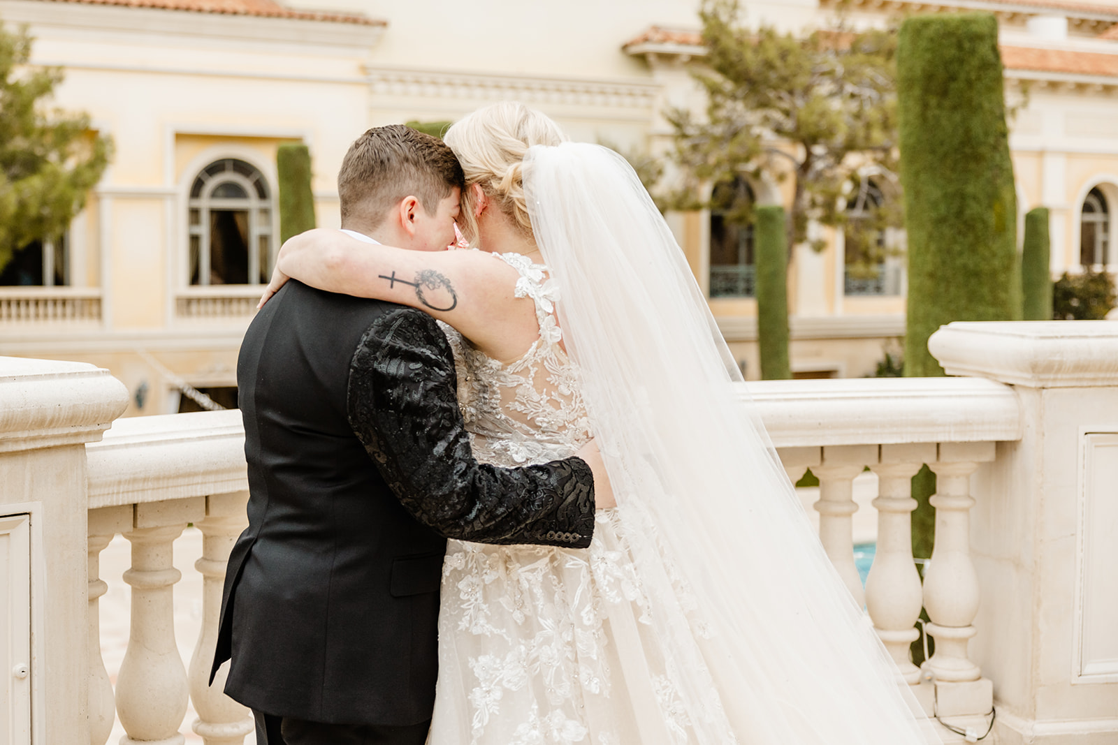 two brides hold each other