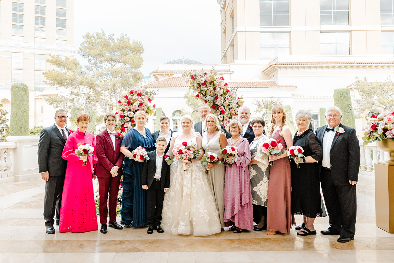 group of people in varying degrees of pink