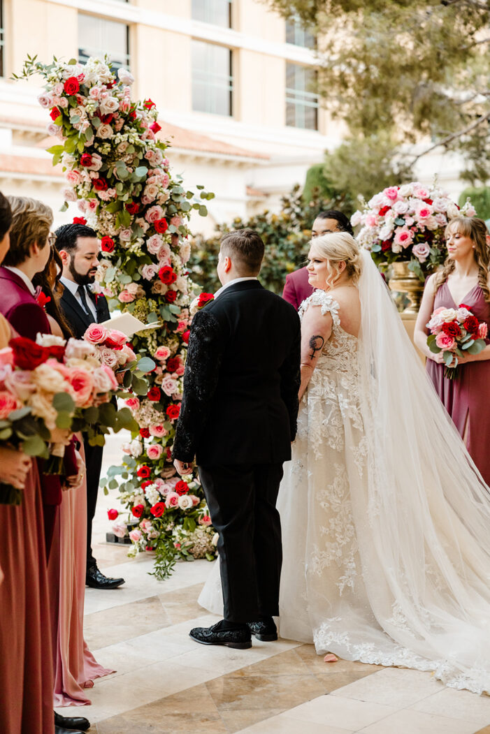 two brides stand at alter during las vegas wedding