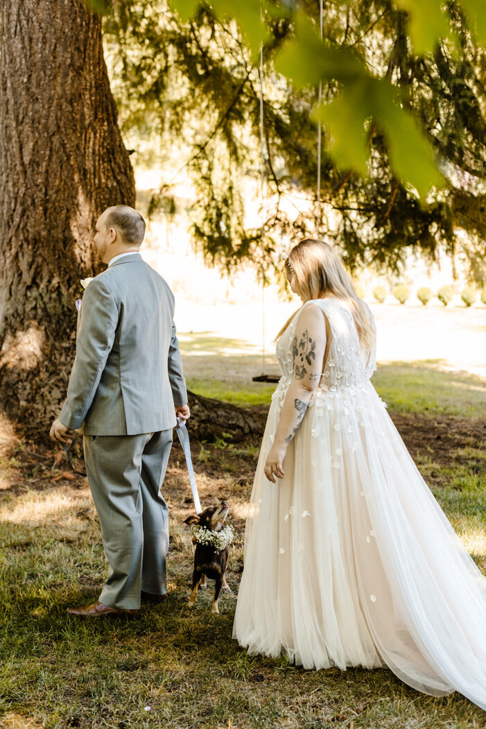 bride approaches groom for first look