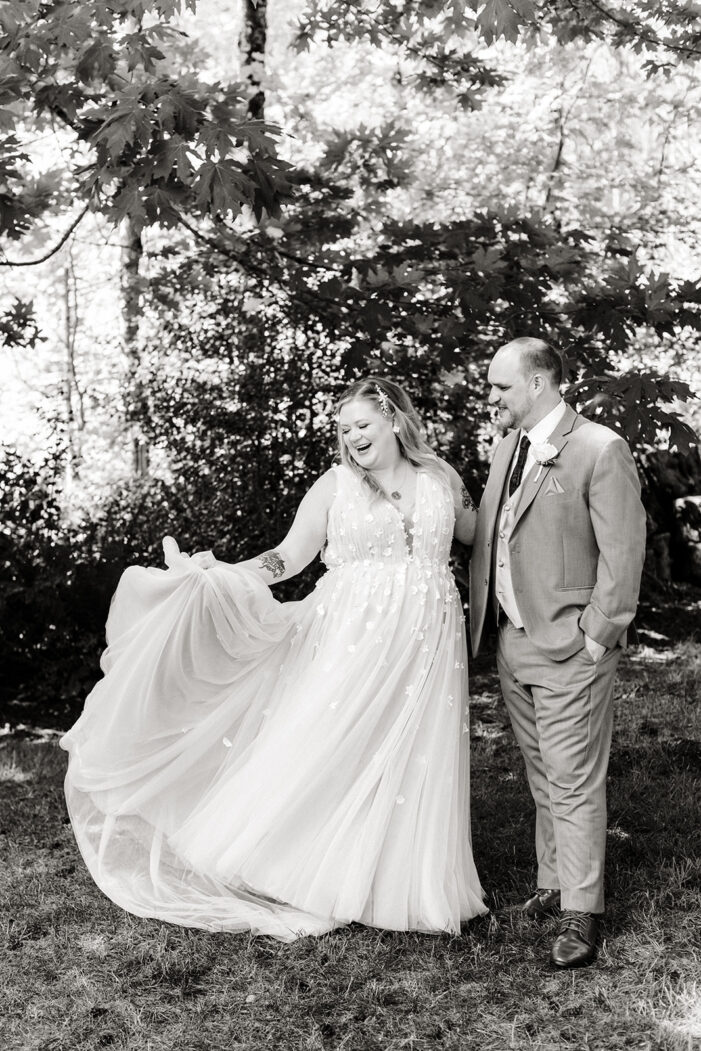 bride and groom stand together