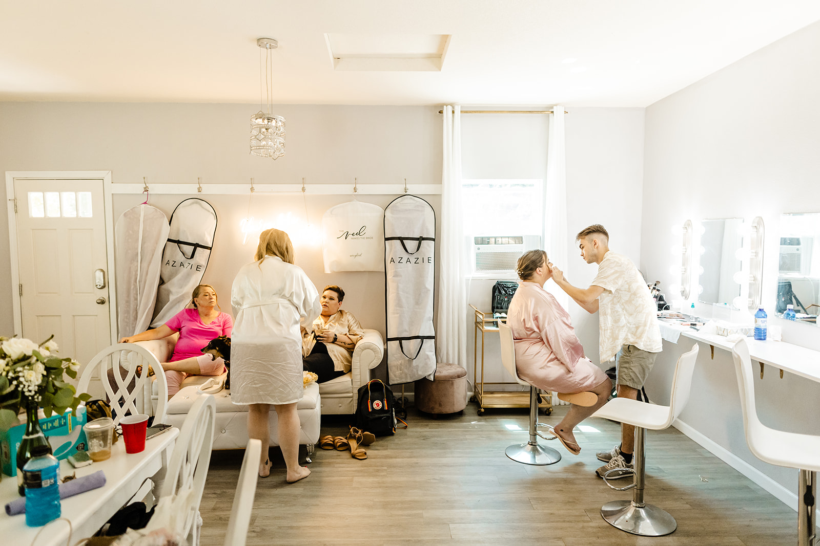 Bride and bridesmaids get ready