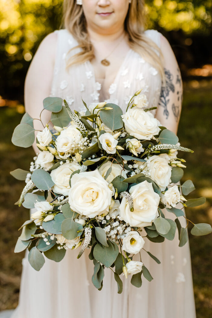 close on white and green bridal bouquet